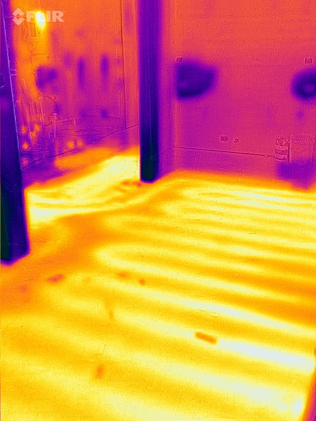 Radiant heated floor in the basement thermal view